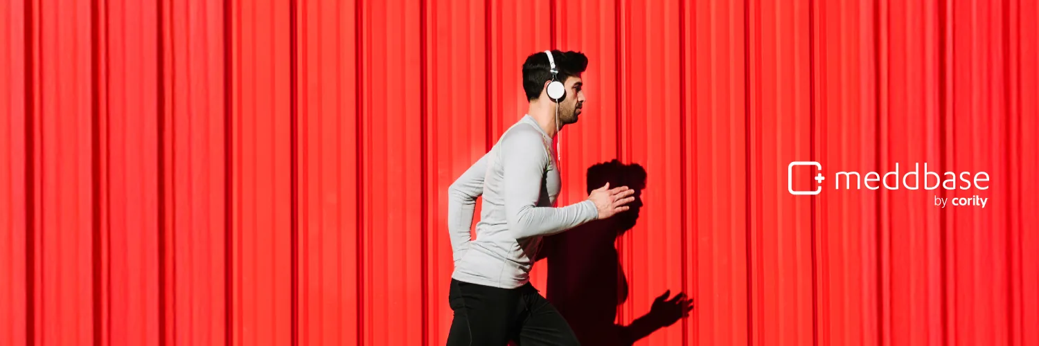 The social header: a runner against a red corrugated wall, the logo set on the right.