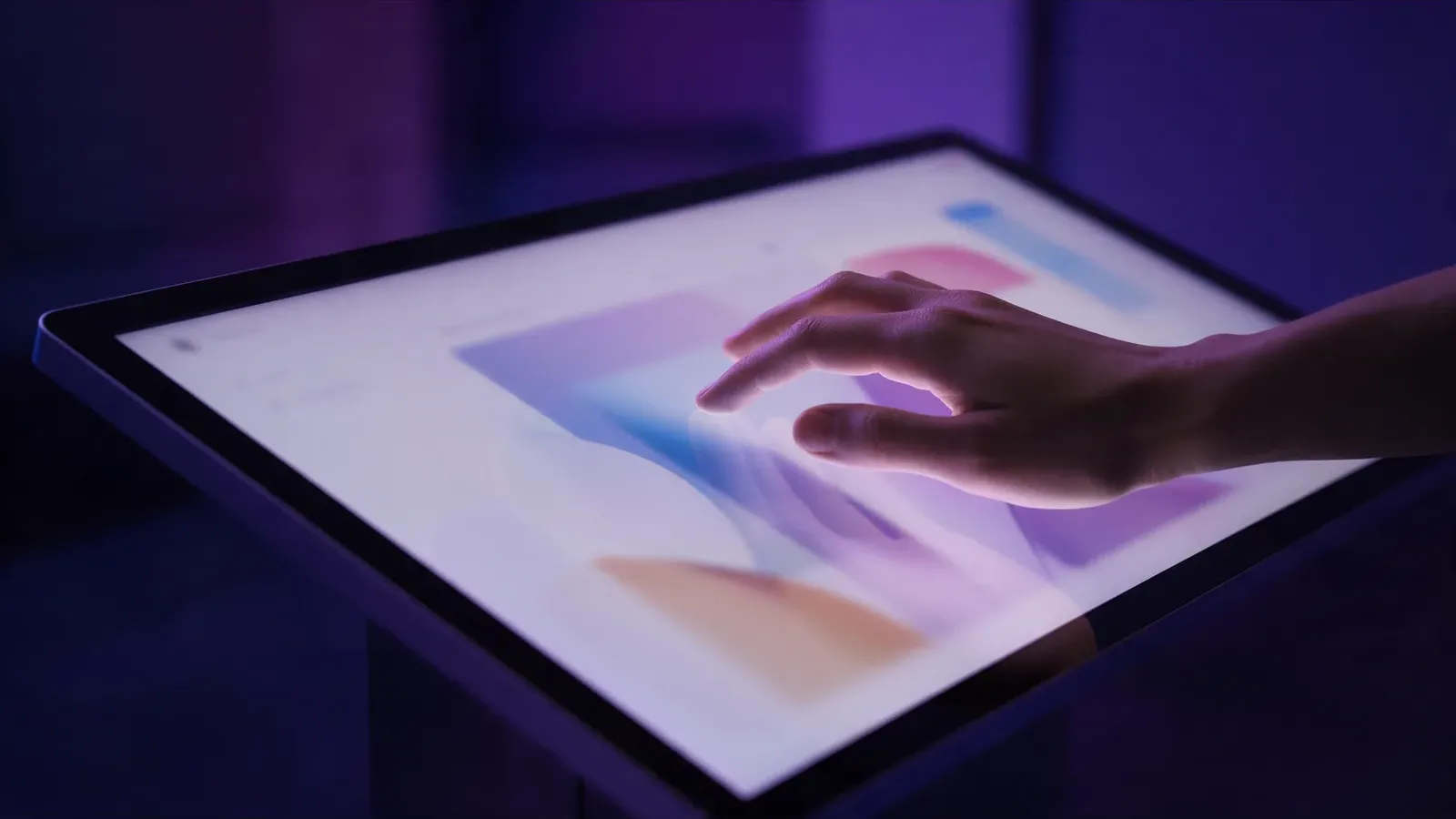 A hand on a touchscreen